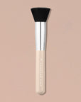 Avocado Zinc SPF Brush with black bristle head and beige handle