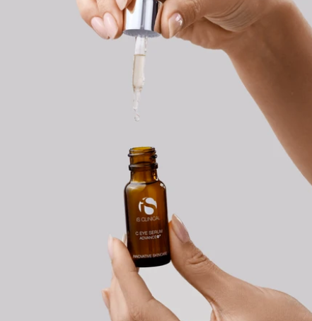 iS Clinical C Eye Serum Advance+ – dropper being drawn from the bottle